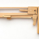 Illustration for article titled DIY Pistol Shoots Out Blocks So You Can Win at Jenga Every Time